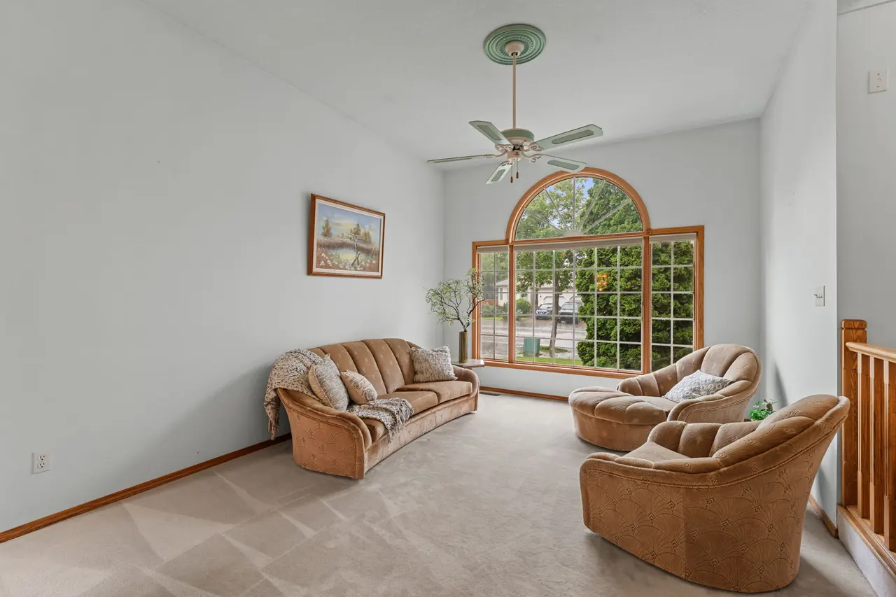 Formal living room with arched window