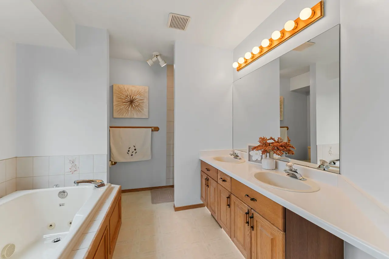 Primary ensuite with jetted tub and dual sinks