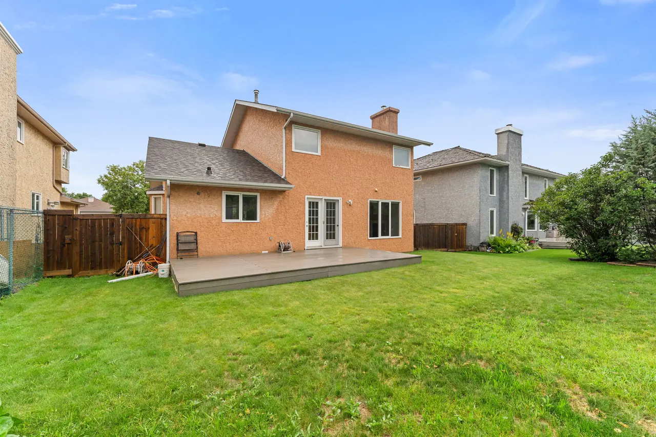 Rear exterior and landscaped lawn