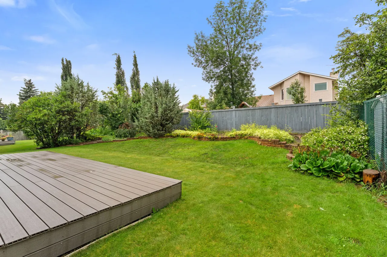 Rear deck and landscaped yard