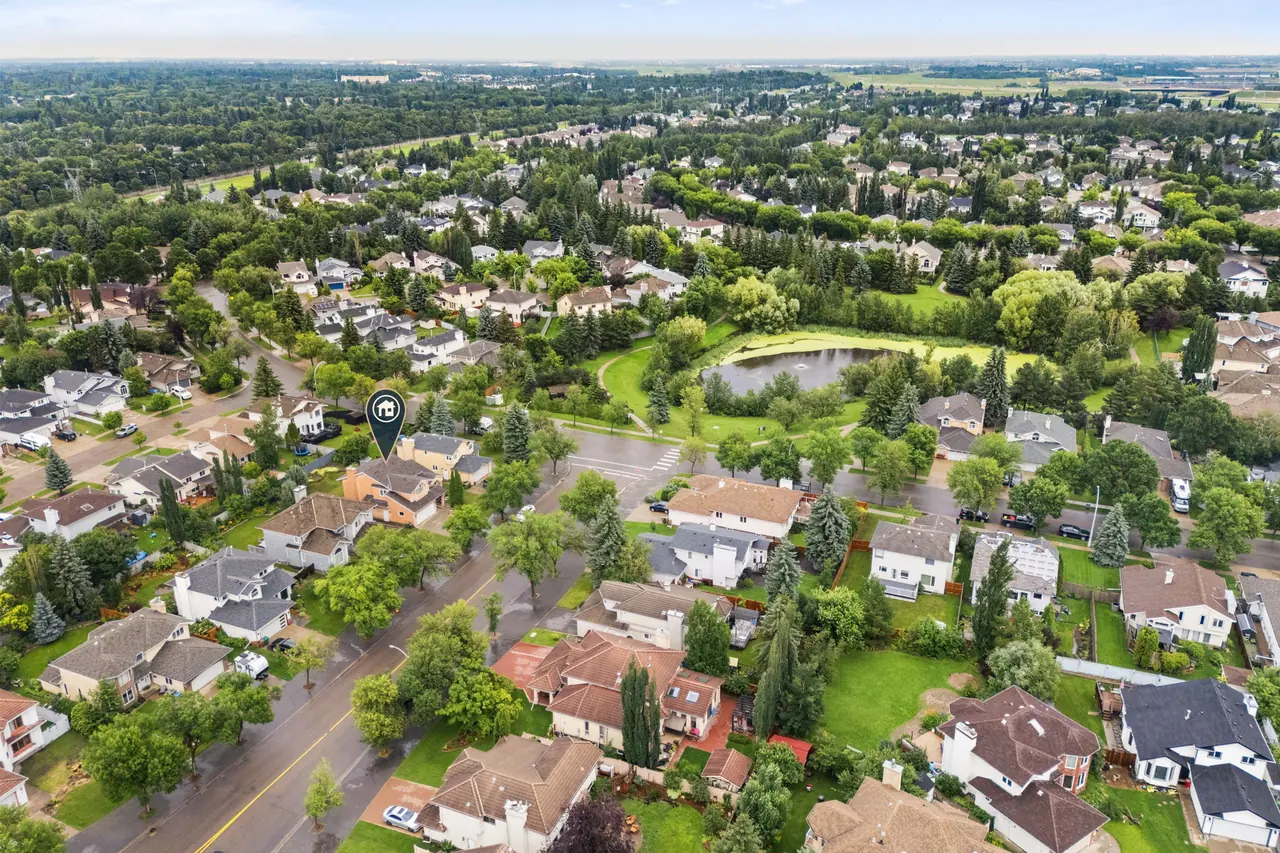 Aerial view of 11 Heritage Boulevard NW and Heritage Lakes